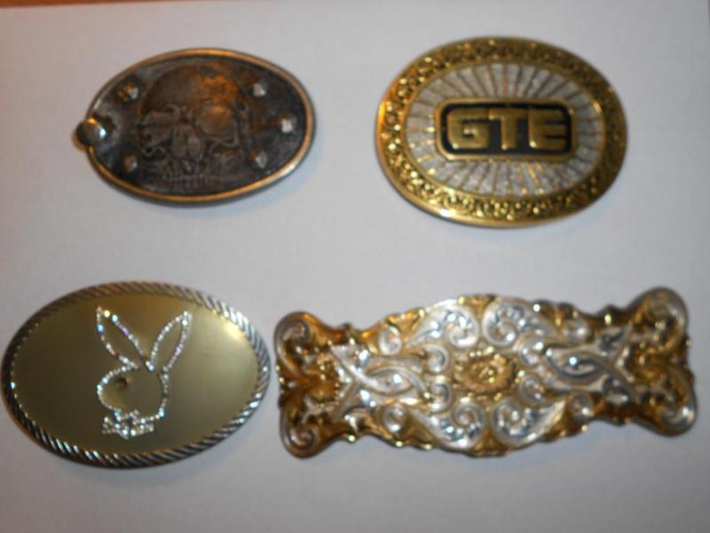 4 belt buckles....