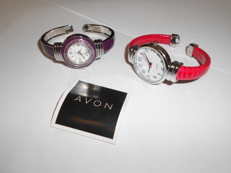 Pair of Ladies Avon quartz watches....