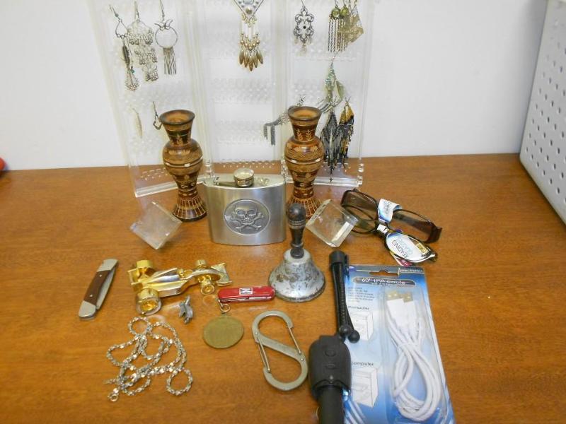 Various items like a necklace, earr...