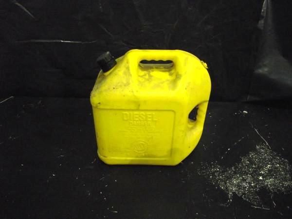 lot 60 image: 5 Gallon Diesel Can   Nozzel pushes...