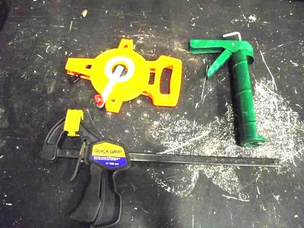 lot 75 image: (1) Caulk Gun, (1) Quick Grip and (...