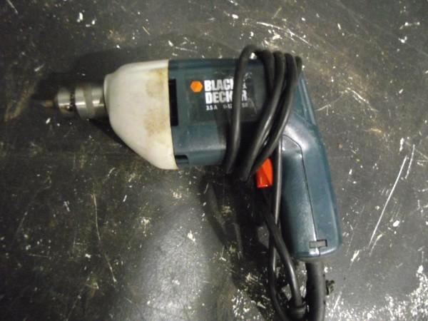 lot 76 image: Black & Decker Drill   Plugged ...