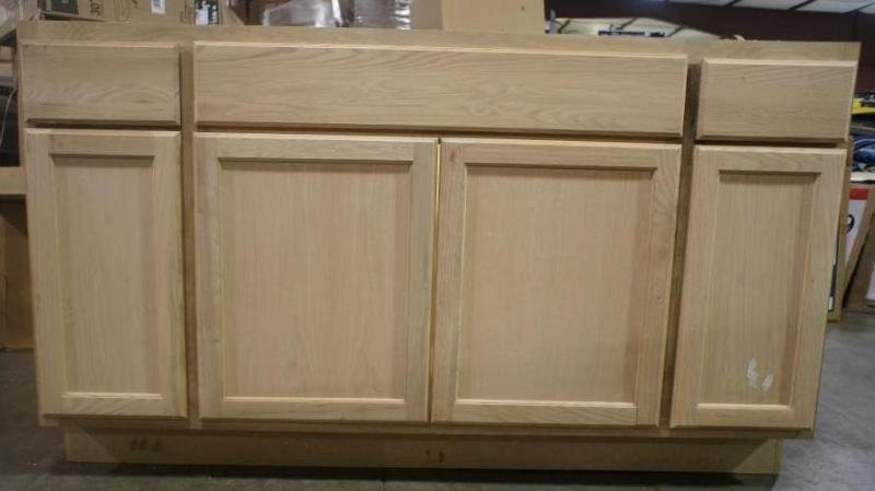 lot 15 image: New 4 door 2 drawer sink base cabi...