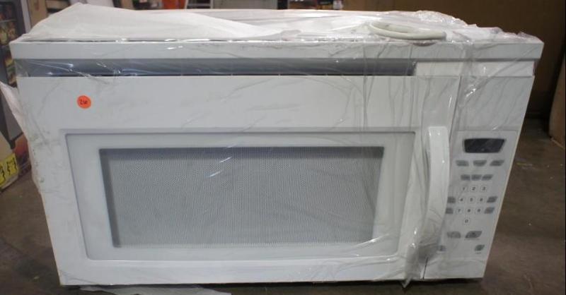 lot 26 image: New still in plastic Microwave. 30&...