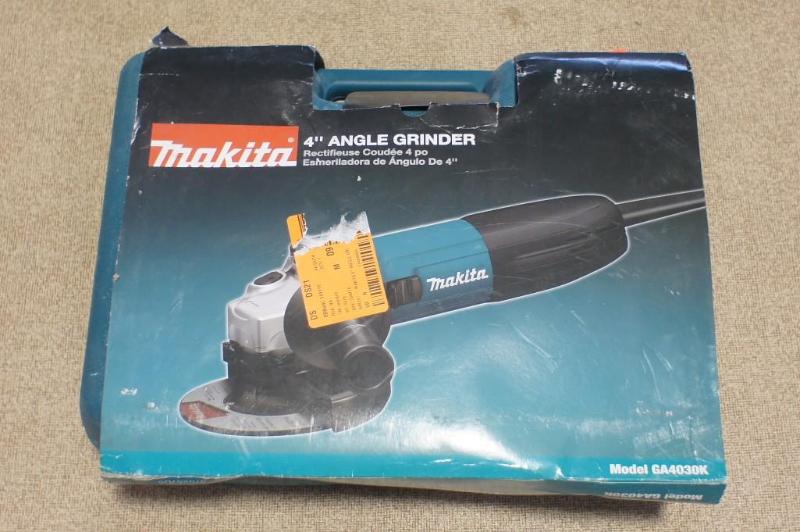 lot 48 image: Makita 4" angle grinder. Used....