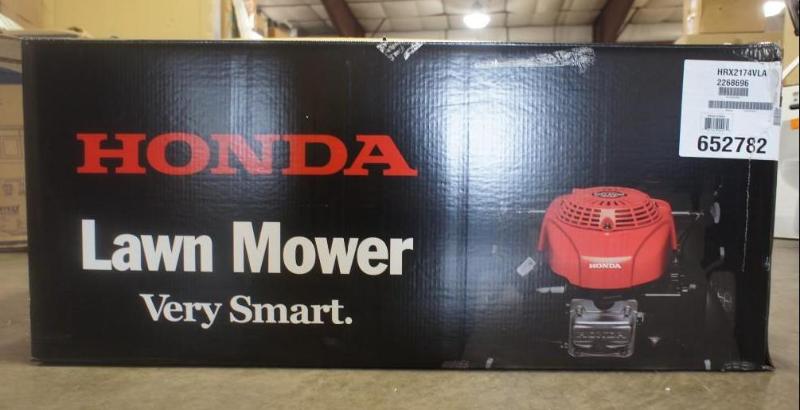 lot 9 image: New In Box Honda HRX217VLA Lawn Mo...