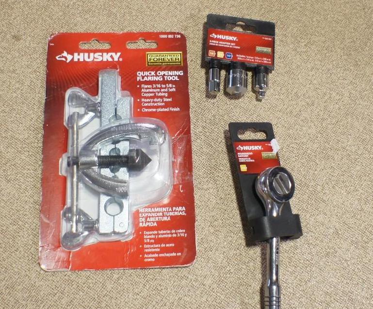 lot 90 image: Lot of (3) Husky brand tools  Quic...
