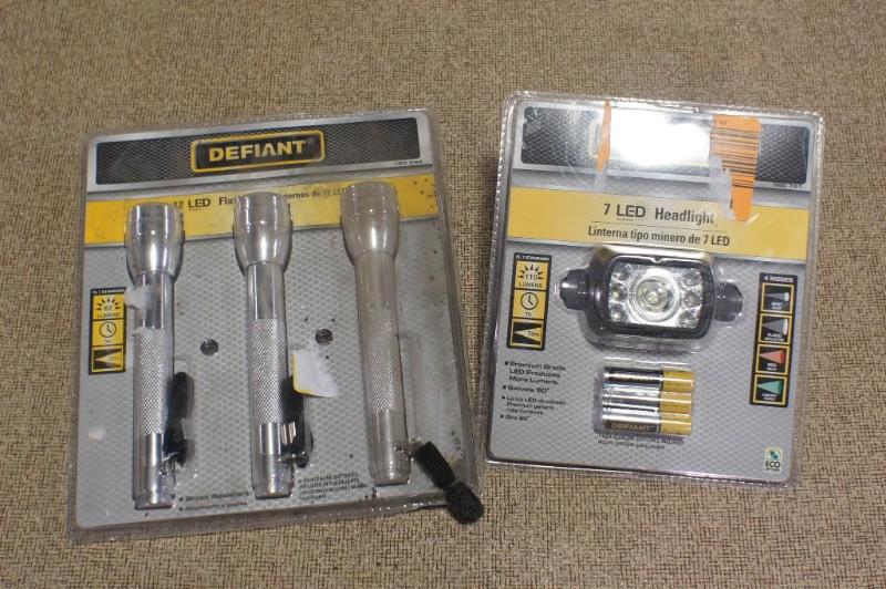 lot 93 image: Lot of Defiant LED flash lights. On...