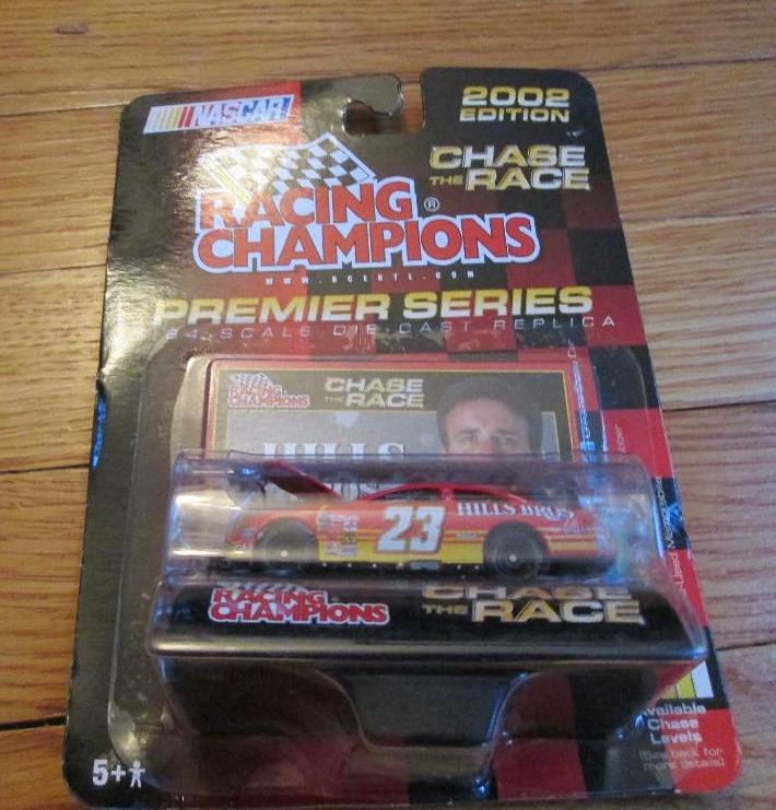 lot 106 image: NASCAR 2002 164 scale car with rot...