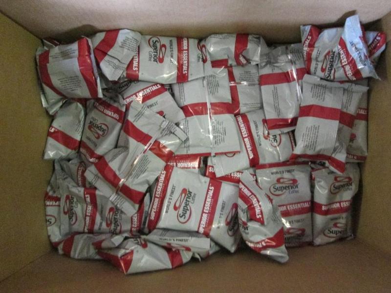 lot 13 image: Partial box of Superior single brew...