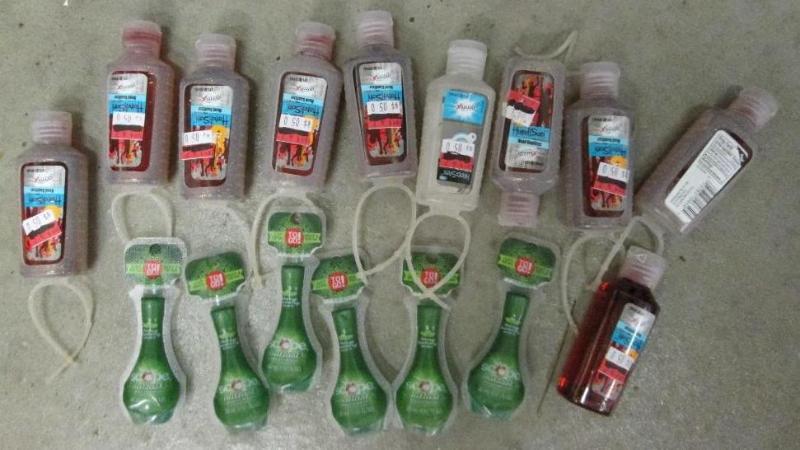 lot 22 image: Lot of pocket size mouthwash and ha...