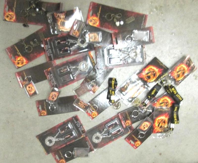 lot 23 image: Lot of Hunger Games items...