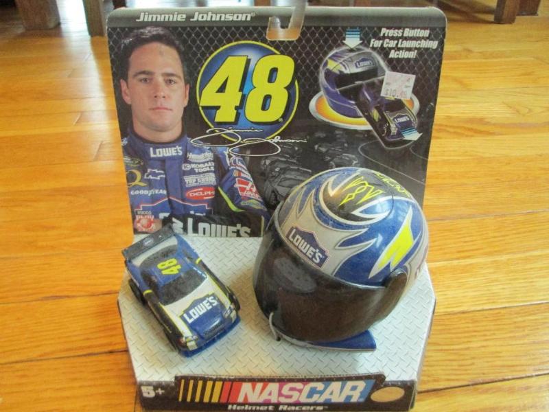 lot 76 image: NASCAR 48 Jimmie Johnson press butt...