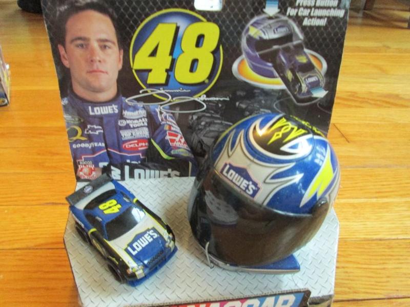 lot 77 image: NASCAR 48 Jimmie Johnson press butt...
