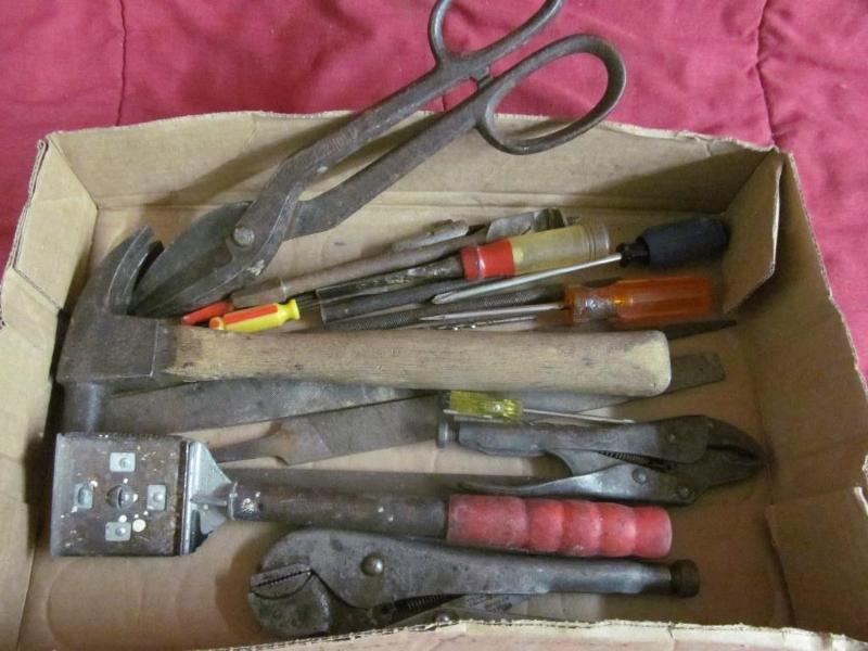 Hammer, snip, crescent wrench, scra...