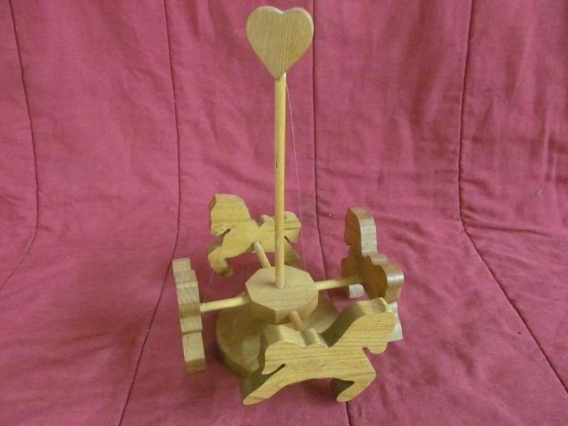 Wood Carousel - Spins Back and Fort...