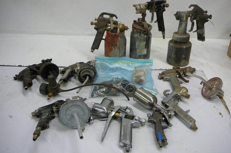 lot 6 image: 9 Paint guns, cups & parts Sold...