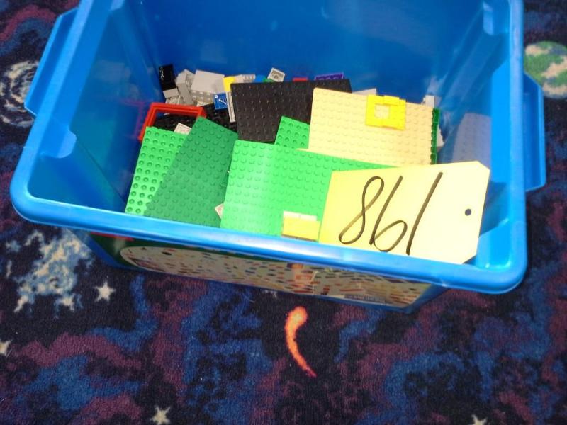 lot 198 image: Plastic box of Lego pieces.