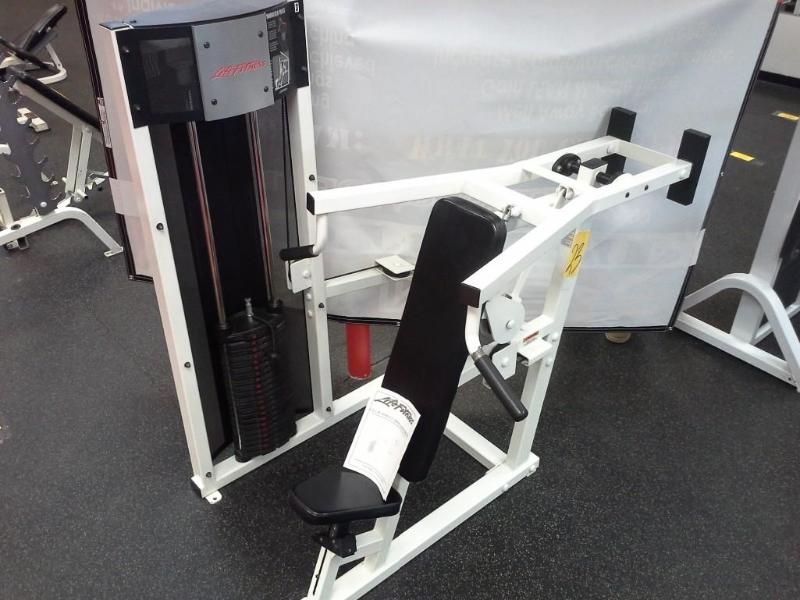 lot 23 image: LifeFitness,  shoulder press machine.