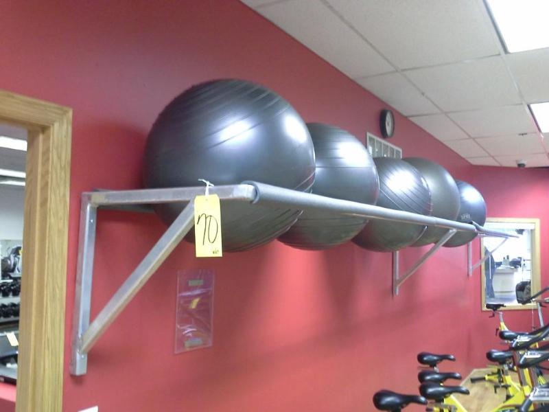 lot 70 image: Wall rack with balls