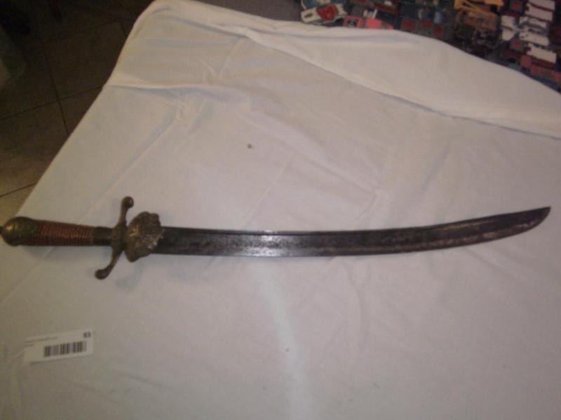 Sword with Engraving on Blade...