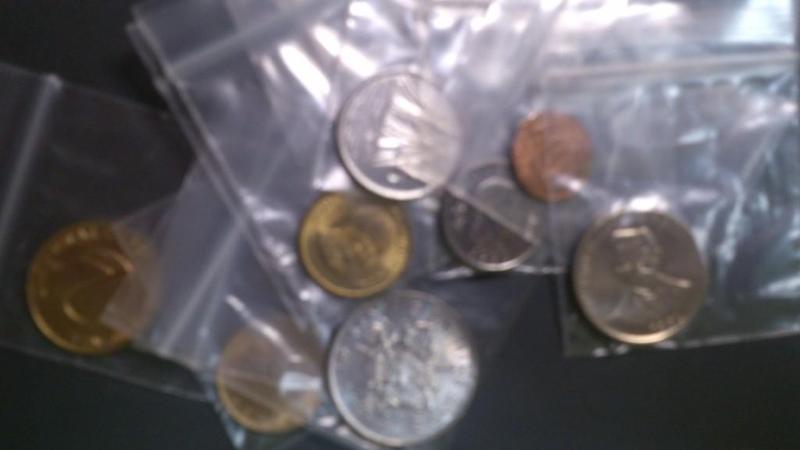 BAG OF TEN MIXED UNCIRCULATED FOREI...