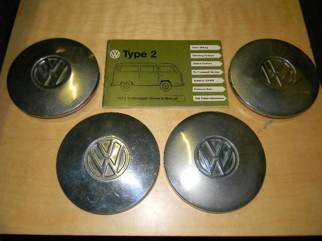 Lot of 5 - four VW hubcaps and one ...
