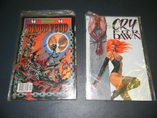 Lot of 2 comic books- (Please inspe...