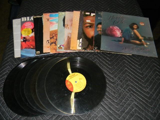 Lot of 17 records. 7 loose &amp 12...