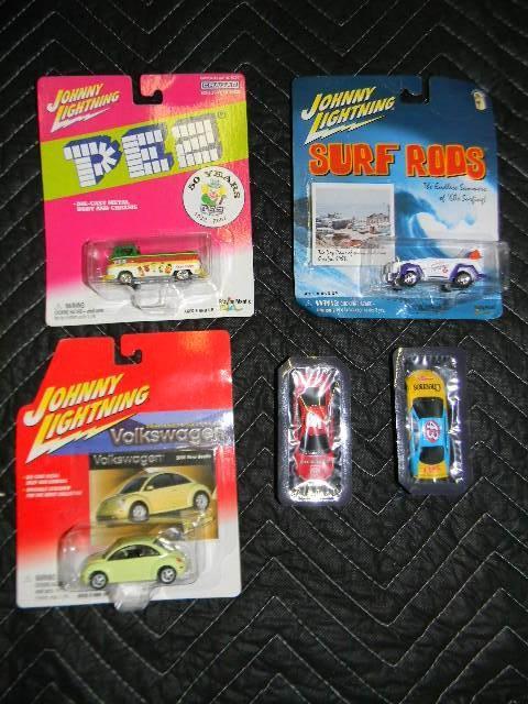 Lot of 5 cars still in packaging. 3...