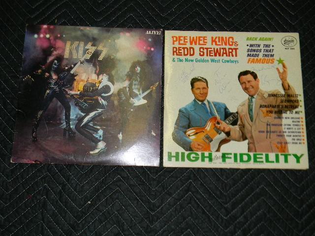 Lot of 2 records. (Kiss and Signed ...