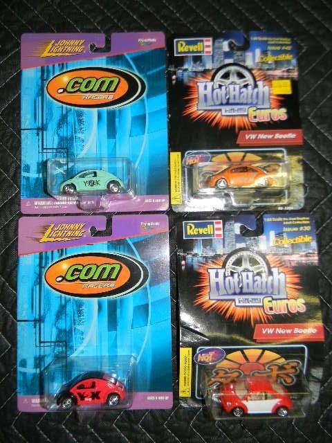 Lot of 4 - two Johnny Lightning car...