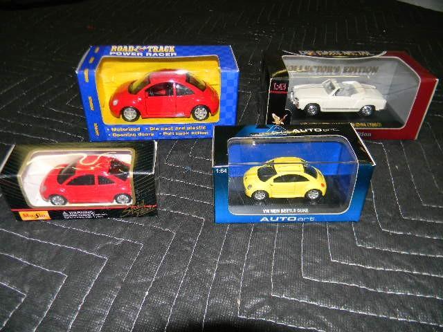Lot of 4 Volkswagen cars - new in t...