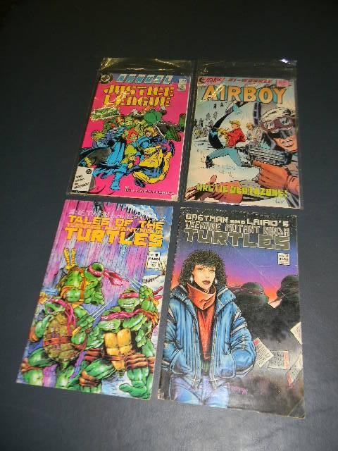 Lot of 4 miscellaneous comic books-...