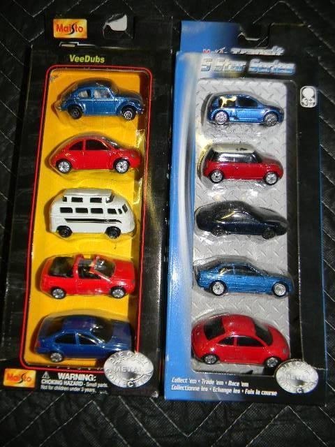 Lot of 2 NEW packages of cars - one...