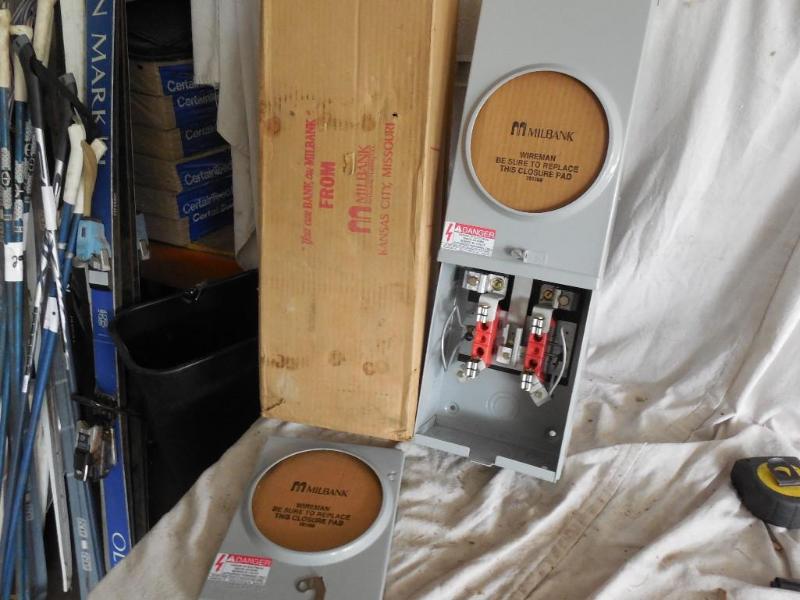 lot 21 image: New Meter Base, Vertical. 2-100 Amp...