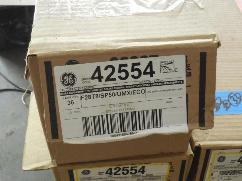 lot 54 image: 1 case of 4 ft. T-8 used lamps. Coo...