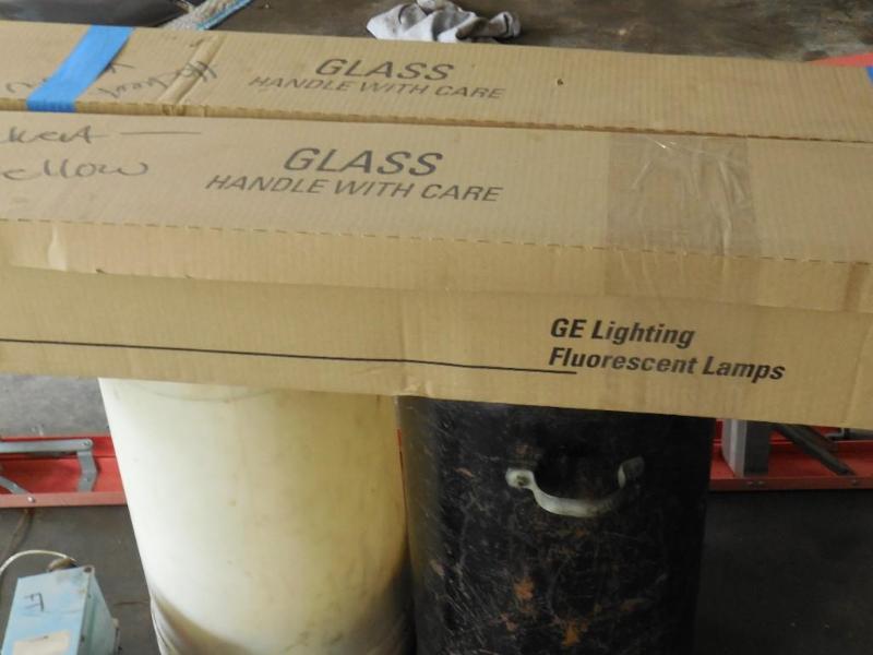 lot 55 image: 1 case of 4 ft. T-8 used lamps. Coo...