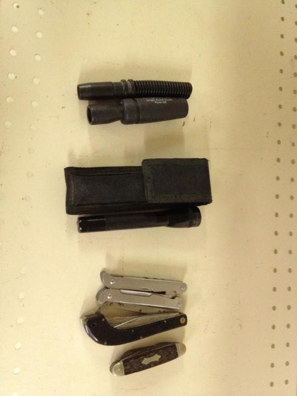 lot 42 image: 3 Pocket Knives, 2 Flashlights, Duck Call, Goose Call
