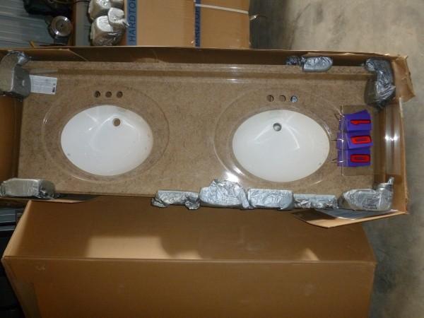 Dual vanity sink. Appears to be lik...