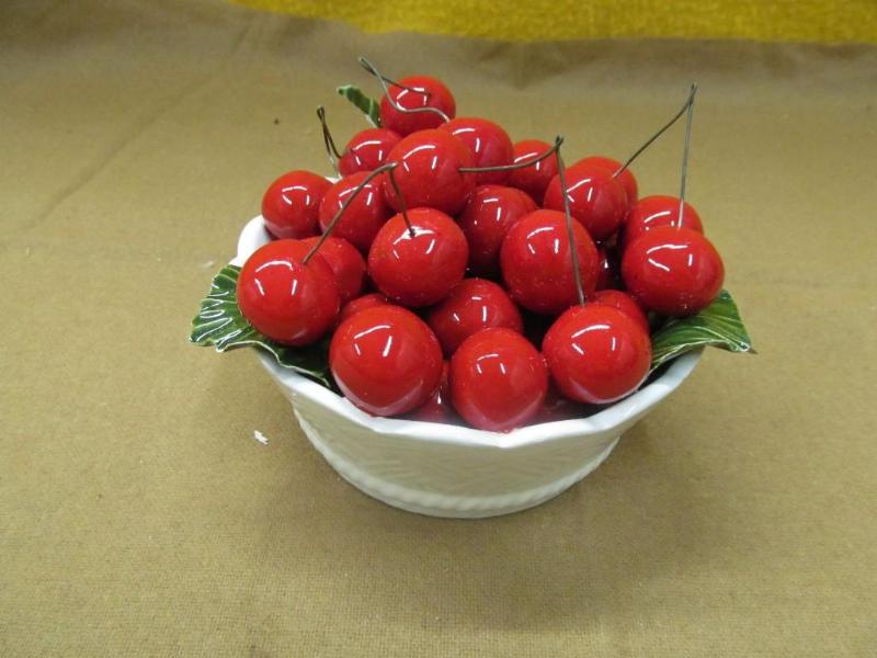 White bowl with cherries...
