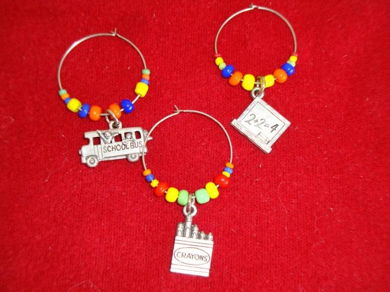 3 hoop earrings - one has chalkboar...