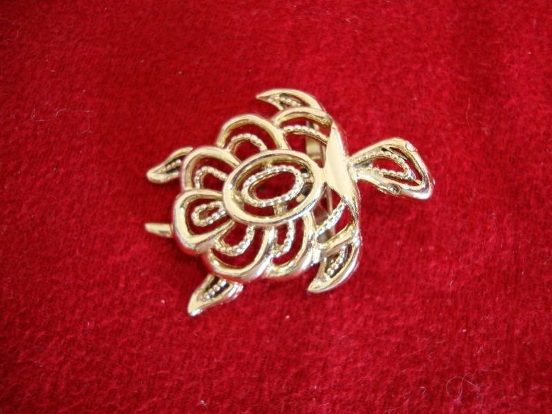 Gold color turtle broach...