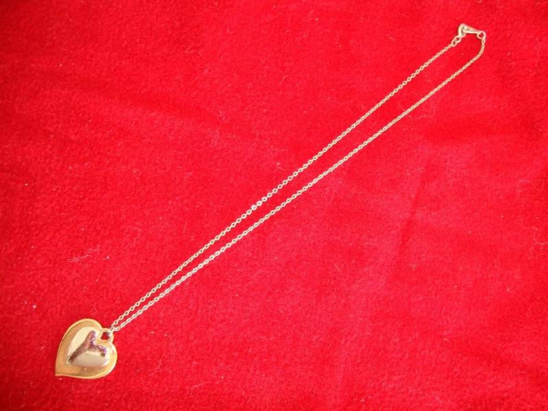 Silver and gold color heart necklac...