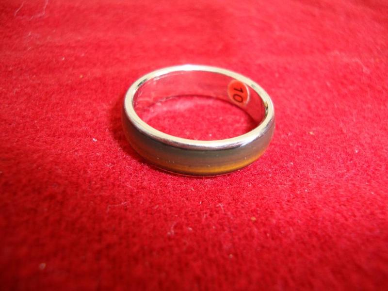 Silver and green color ring - has 1...