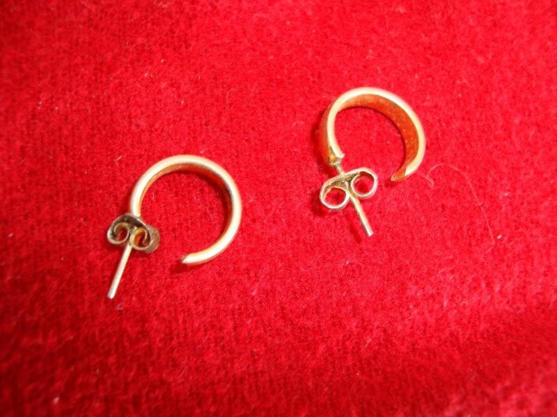 Gold color hoop style earrings...