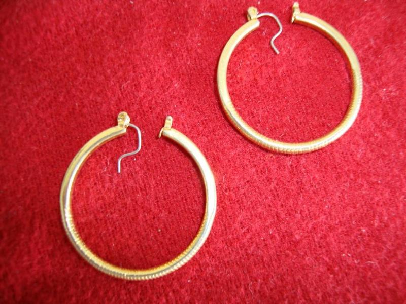 Gold color hoop style earrings...