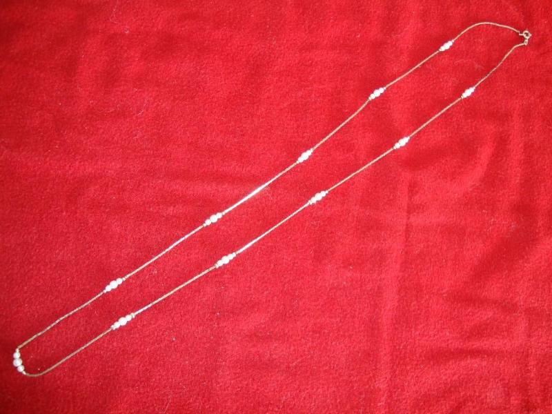 Silver color and pearl style neckla...