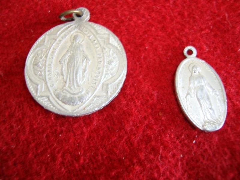 2 - silver in color necklace pieces...