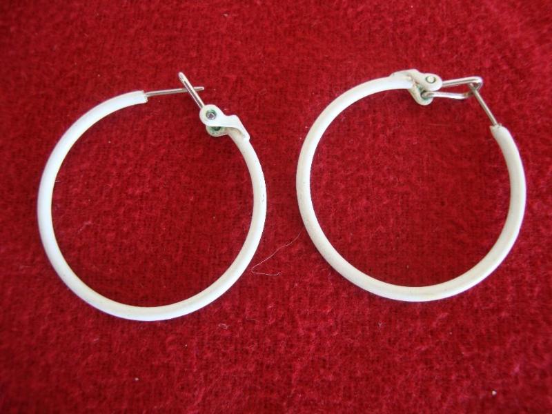 White hoop earrings...